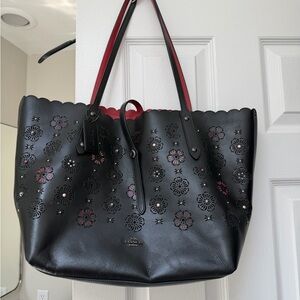 Coach Black Floral Laser-Cut Tote with Red Interior Trim